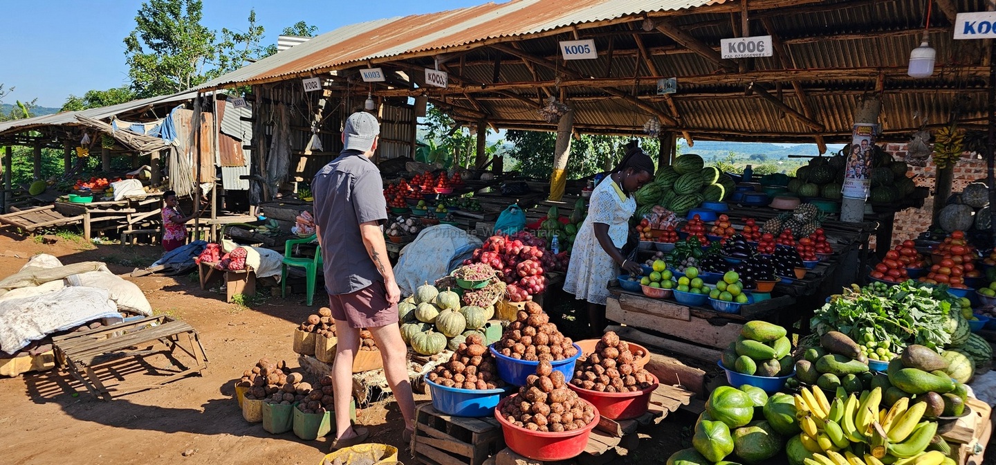 Authentic cultural immersion with Jackal Wild Adventurers at a bustling Ugandan market in March
