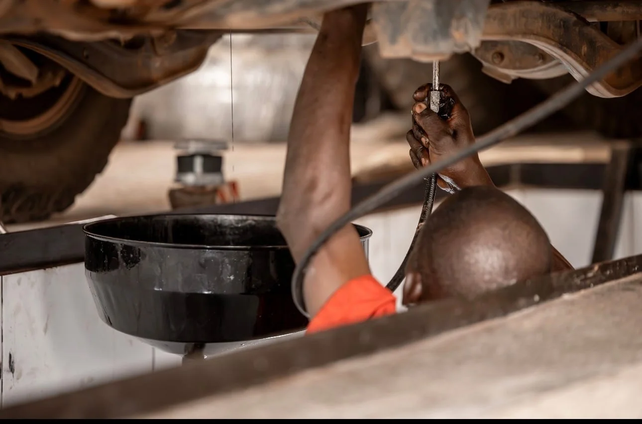 In-house mechanics servicing a safari Land Cruiser