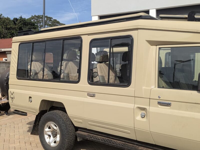 Oversized panoramic windows of a safari Land Cruiser